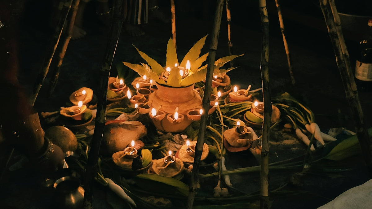 A bunch of candles that are on a table
