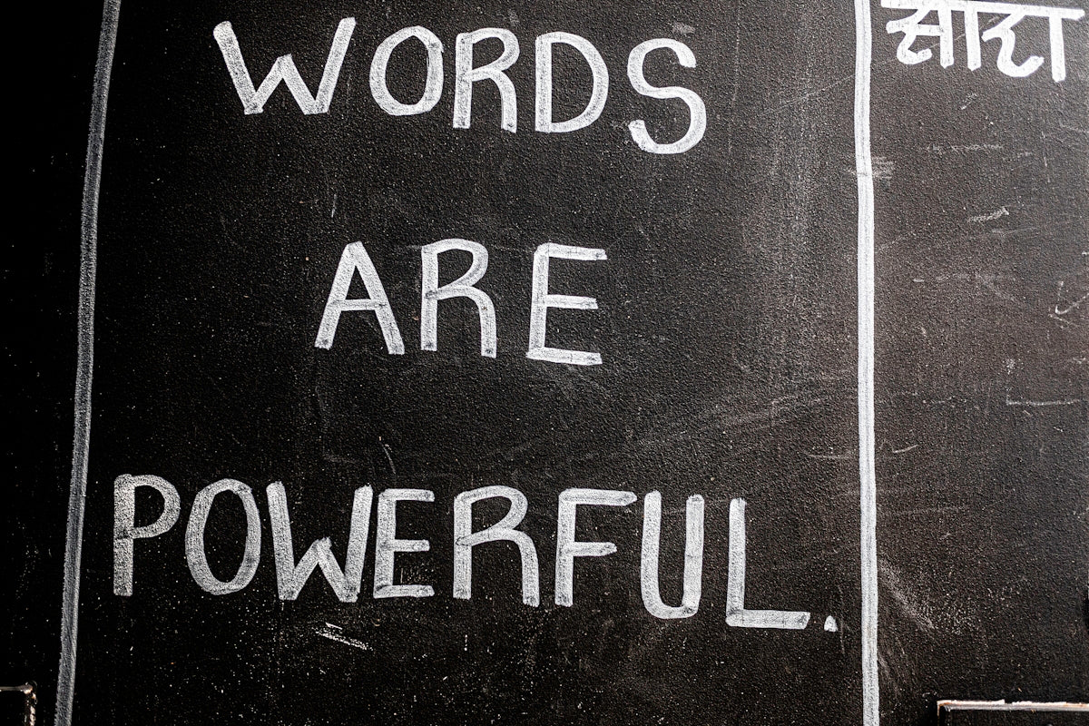 Words are powerful written on a blackboard.